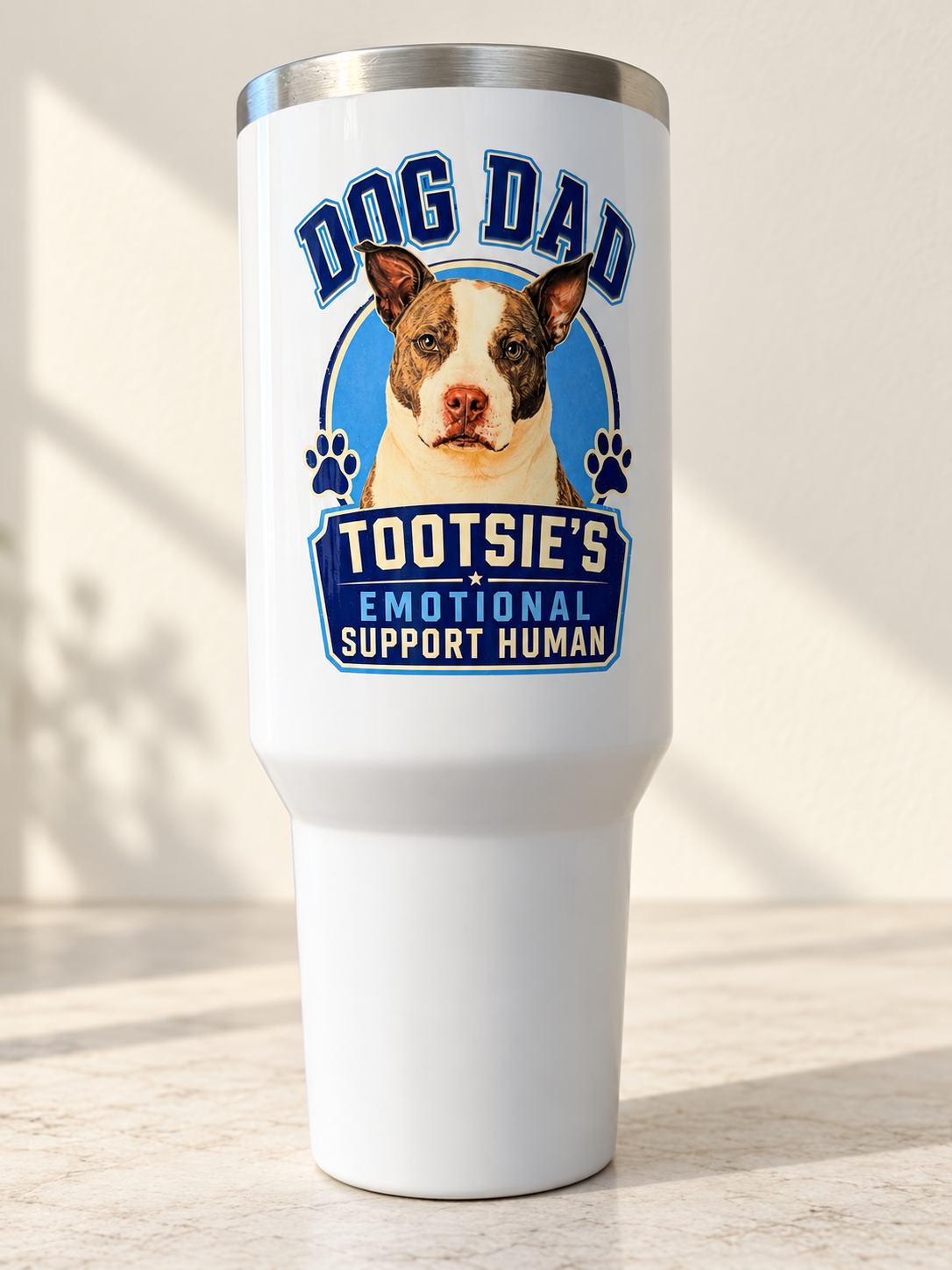Styled mockup of custom Dog Dad tumbler; Tootsie example